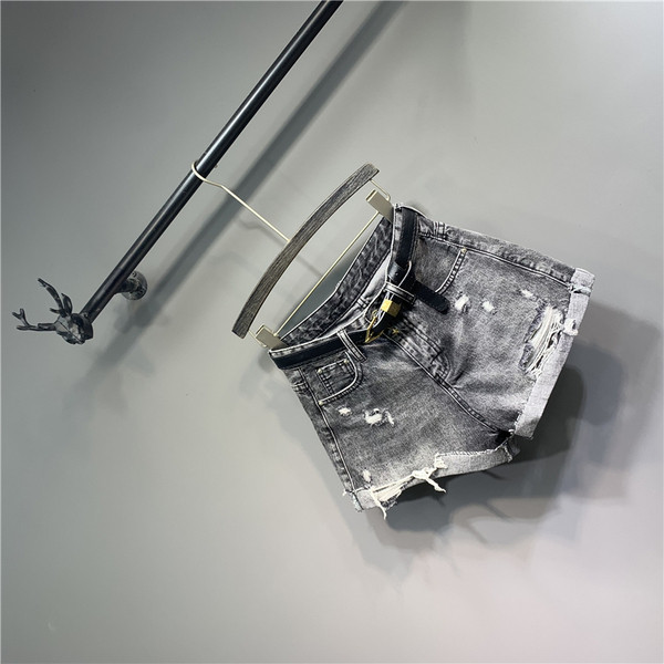 Modern női nadrág szakadt elemekkel - retro stílusú