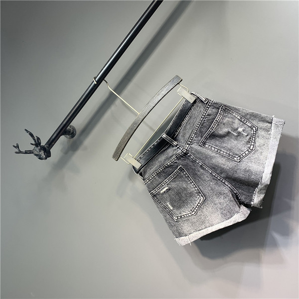 Modern női nadrág szakadt elemekkel - retro stílusú