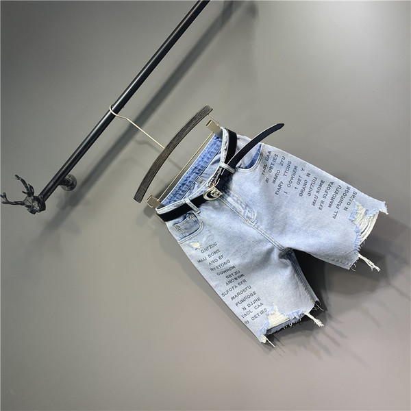 Új női farmer modell szakadt motívumokkal és övvel