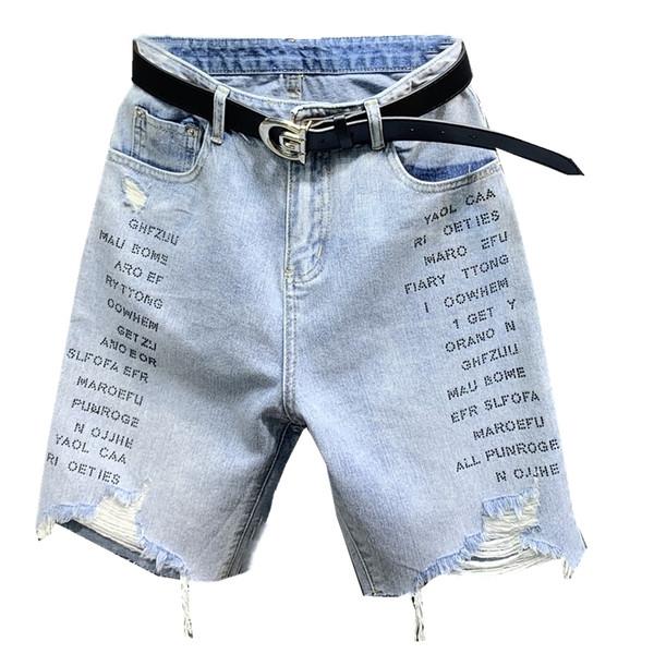 Új női farmer modell szakadt motívumokkal és övvel