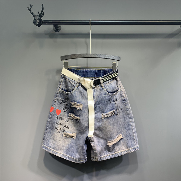 Aplikatsioonide ja rebenenud motiividega vabaaja naiste teksad