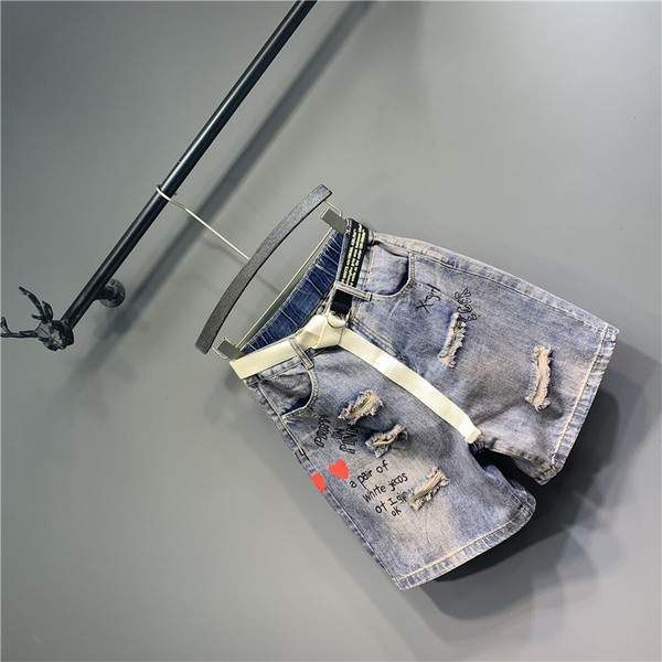 Aplikatsioonide ja rebenenud motiividega vabaaja naiste teksad