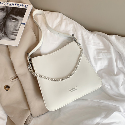 Eko bőrből készült alkalmi női táska két füllel