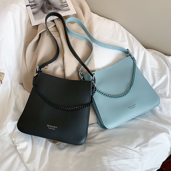 Eko bőrből készült alkalmi női táska két füllel