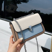 Bőr kézitáska hosszú fém fogantyúval