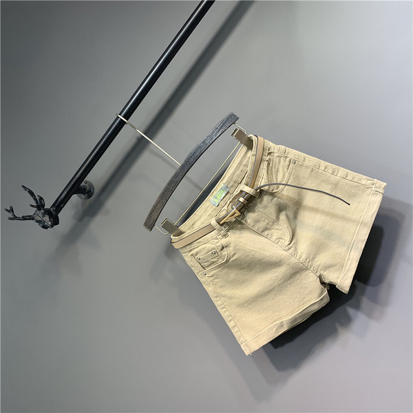 Új modell rövid női farmer övvel és magas derékkal