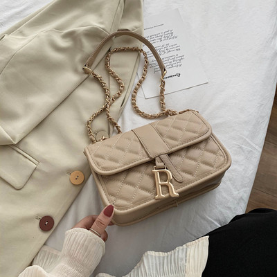 Eko bőrből készült női táska hosszú füllel, fém díszítéssel