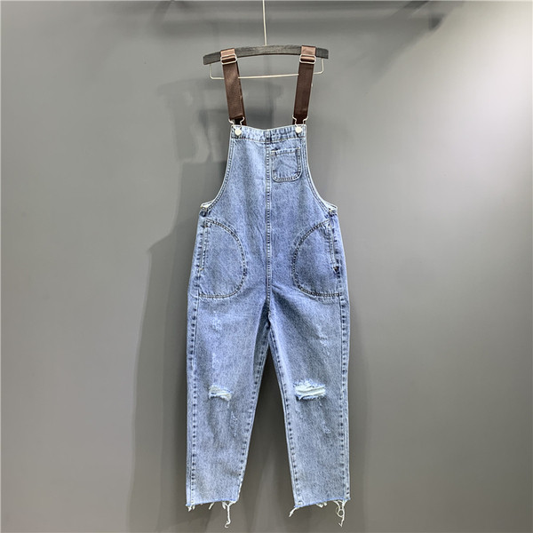 Női farmer overall új modellje szakadt motívumokkal