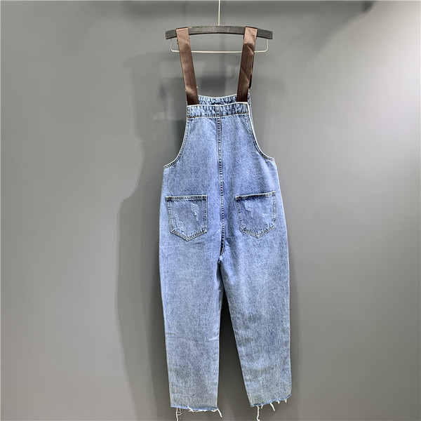 Női farmer overall új modellje szakadt motívumokkal