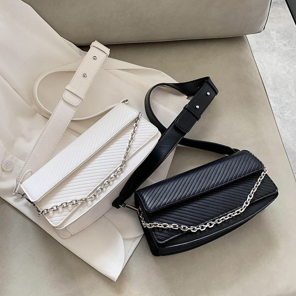 Modern női táska eco bőrből és hosszú füllel