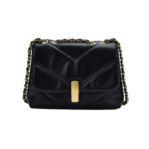 Stílusos női táska hosszú füllel és fém rögzítéssel