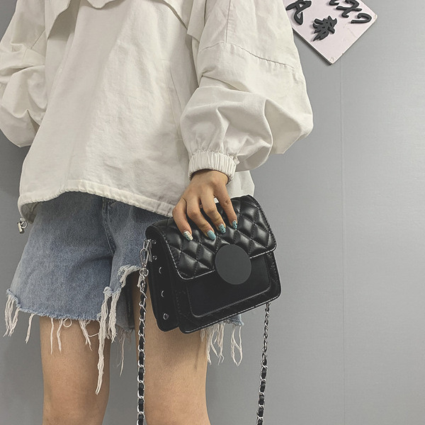 Női táska hosszú fém fogantyúval, öko bőrből