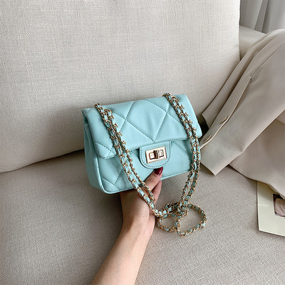 Modern női táska öko bőrből és hosszú fém fogantyúval