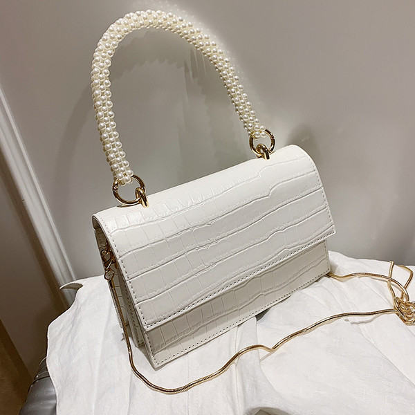 Stílusos női táska két füllel és egy rövid füllel gyöngyökkel - két modell