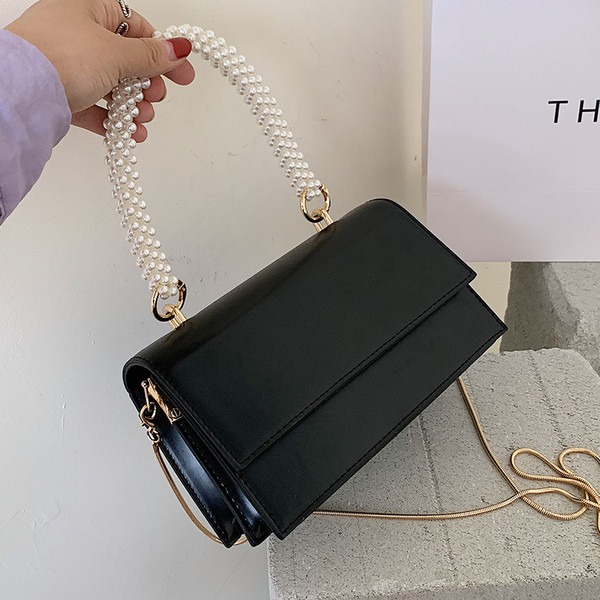 Stílusos női táska két füllel és egy rövid füllel gyöngyökkel - két modell