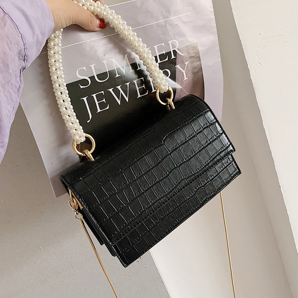 Stílusos női táska két füllel és egy rövid füllel gyöngyökkel - két modell