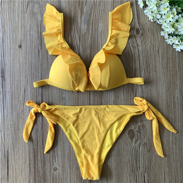 Kétrészes női fürdőruha mély nyakkivágással és megkötővel