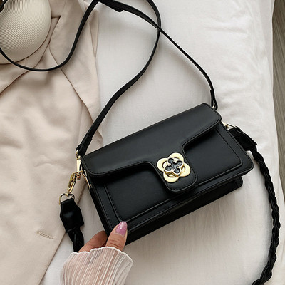 Modern női táska eko bőrből, fém rögzítéssel