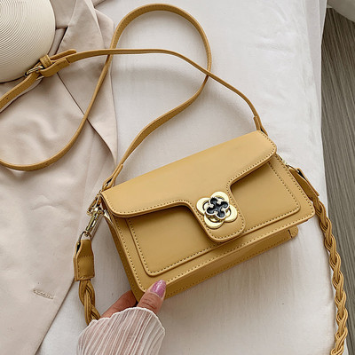 Modern női táska eko bőrből, fém rögzítéssel