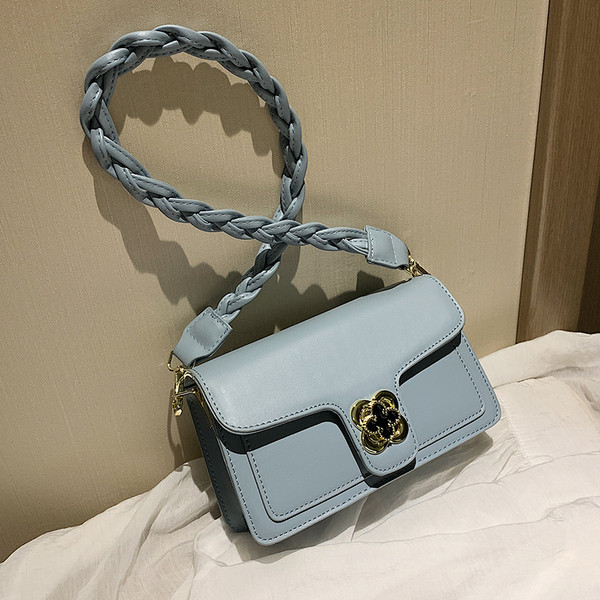 Modern női táska eko bőrből, fém rögzítéssel