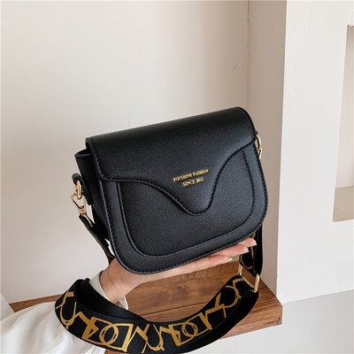 Műbőr női táska textil fogantyúval