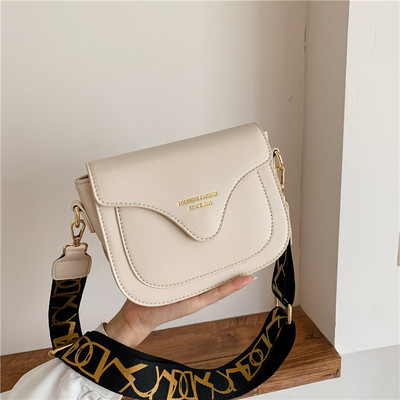 Műbőr női táska textil fogantyúval