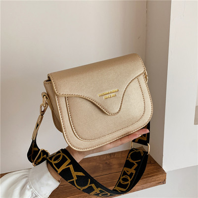 Műbőr női táska textil fogantyúval