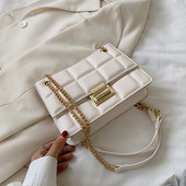 Stiilne metallist kinnitusega ökonahast naistekott