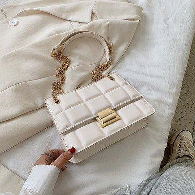 Stiilne metallist kinnitusega ökonahast naistekott