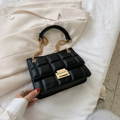 Stiilne metallist kinnitusega ökonahast naistekott