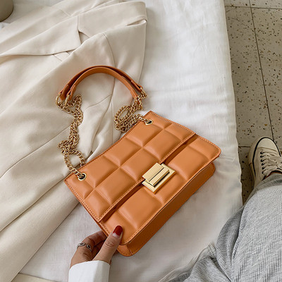 Stiilne metallist kinnitusega ökonahast naistekott