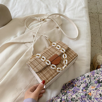 Γυναικεία υφασμάτινη τσάντα με μακριά λαβή και μεταλλική ταφή