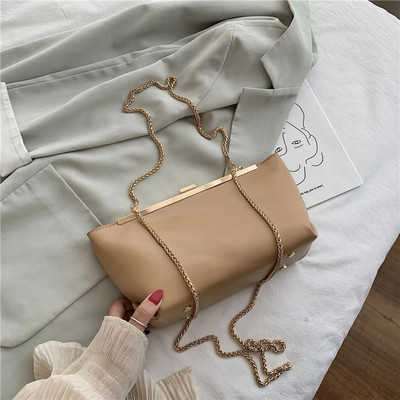 Stílusos női táska eko bőrből és fém rögzítéssel