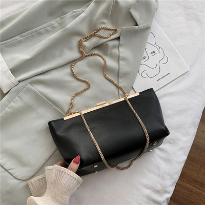 Stílusos női táska eko bőrből és fém rögzítéssel