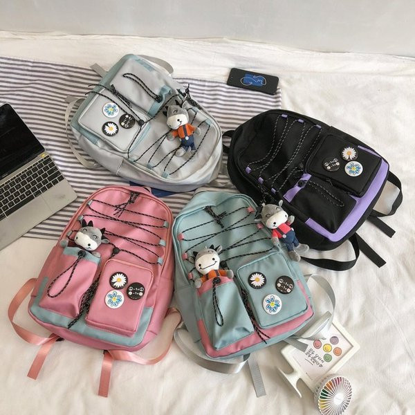 Uue mudeli naiste seljakott esitaskute ja lukuga