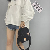 Mitmes värvitoonis aplikatsiooniga naiste tekstiilist kott