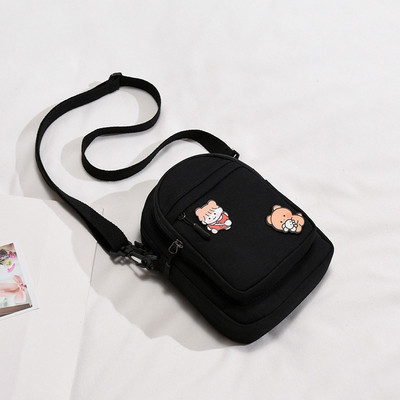 Mitmes värvitoonis aplikatsiooniga naiste tekstiilist kott