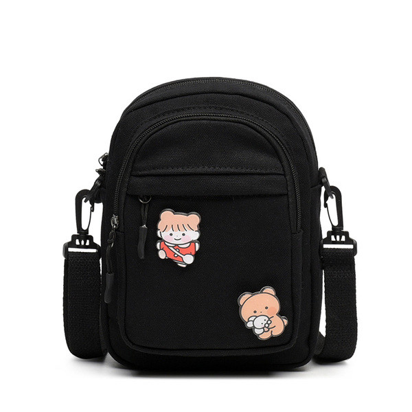 Mitmes värvitoonis aplikatsiooniga naiste tekstiilist kott