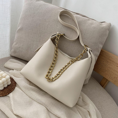 Σύγχρονη γυναικεία τσάντα από οικολογικό δέρμα με μεταλλική αλυσίδα