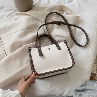 Σύγχρονη γυναικεία τσάντα με μακριά και κοντή λαβή από οικολογικό δέρμα