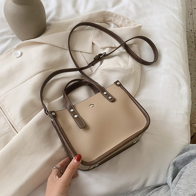 Σύγχρονη γυναικεία τσάντα με μακριά και κοντή λαβή από οικολογικό δέρμα