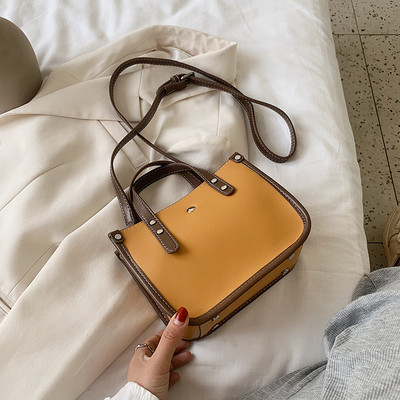 Σύγχρονη γυναικεία τσάντα με μακριά και κοντή λαβή από οικολογικό δέρμα