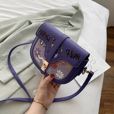 Női táska fém csattal és hosszú füllel, öko bőrből