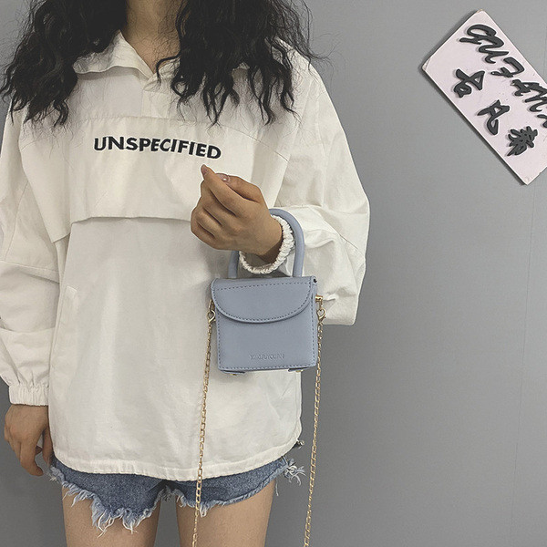 Női kisméretű ökobőr táska rövid és hosszú füllel