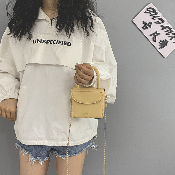 Női kisméretű ökobőr táska rövid és hosszú füllel