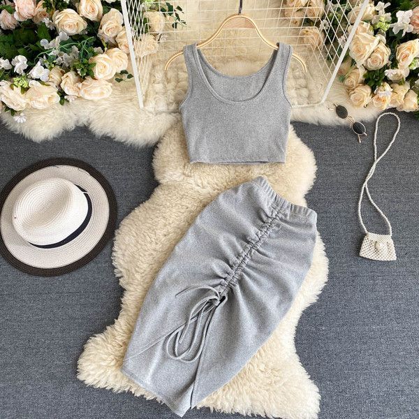 Moodne kõrge vöökoha ja lühikese ülaosaga naiste seelikukomplekt