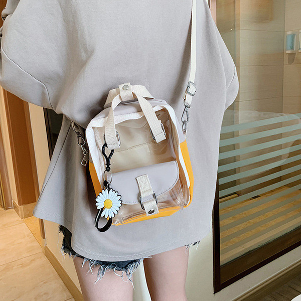 Σύγχρονη γυναικεία τσάντα με κοντές και μεγάλες λαβές σε κίτρινο και πράσινο χρώμα