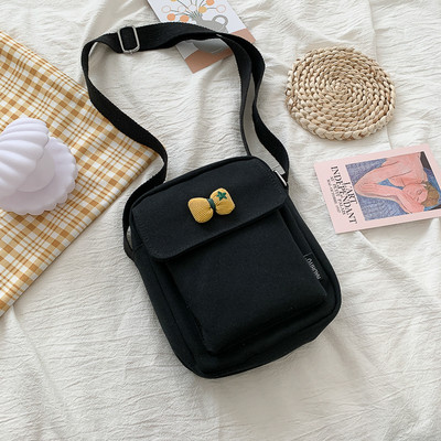 Γυναικεία υφασμάτινη τσάντα με μακριά λαβή και κορδέλα