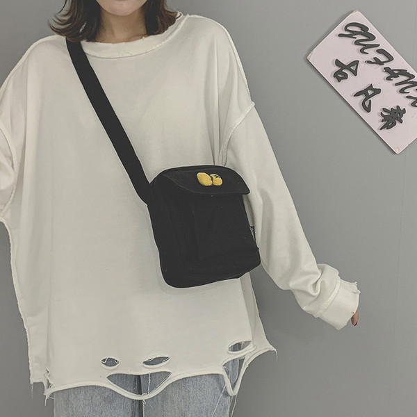 Γυναικεία υφασμάτινη τσάντα με μακριά λαβή και κορδέλα