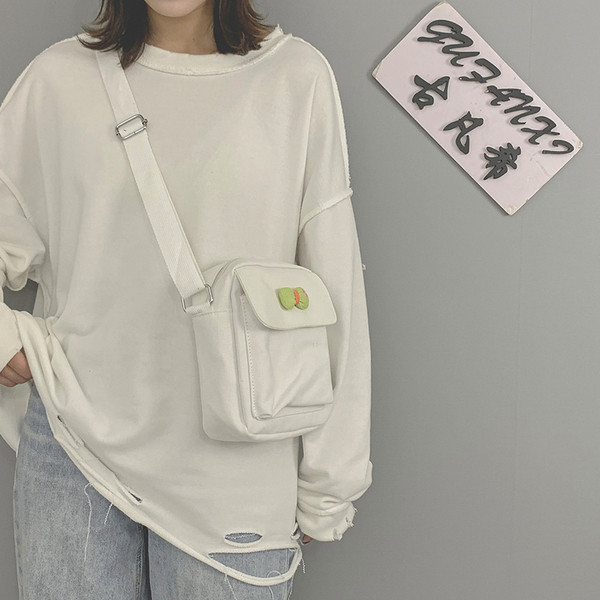 Γυναικεία υφασμάτινη τσάντα με μακριά λαβή και κορδέλα